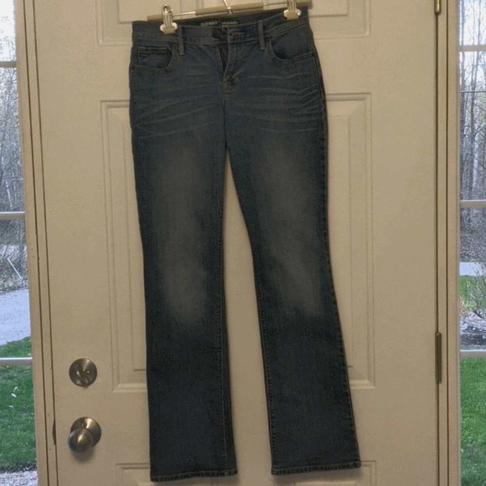 boot-cut blue jeans, never worn
